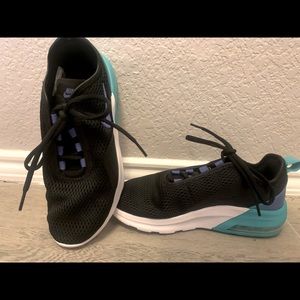 Black and white and blue nikes